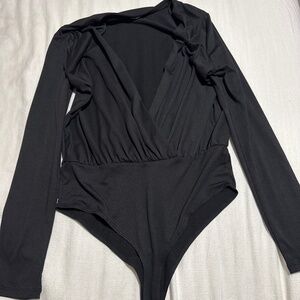 Black body suit deep V